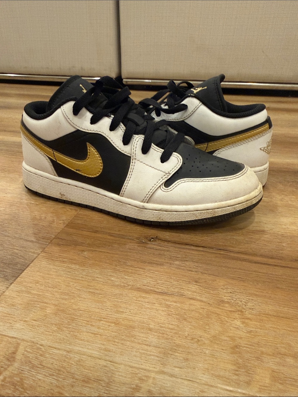 Nike Kids Low-Top Sneakers in Black, White & Gold Accent